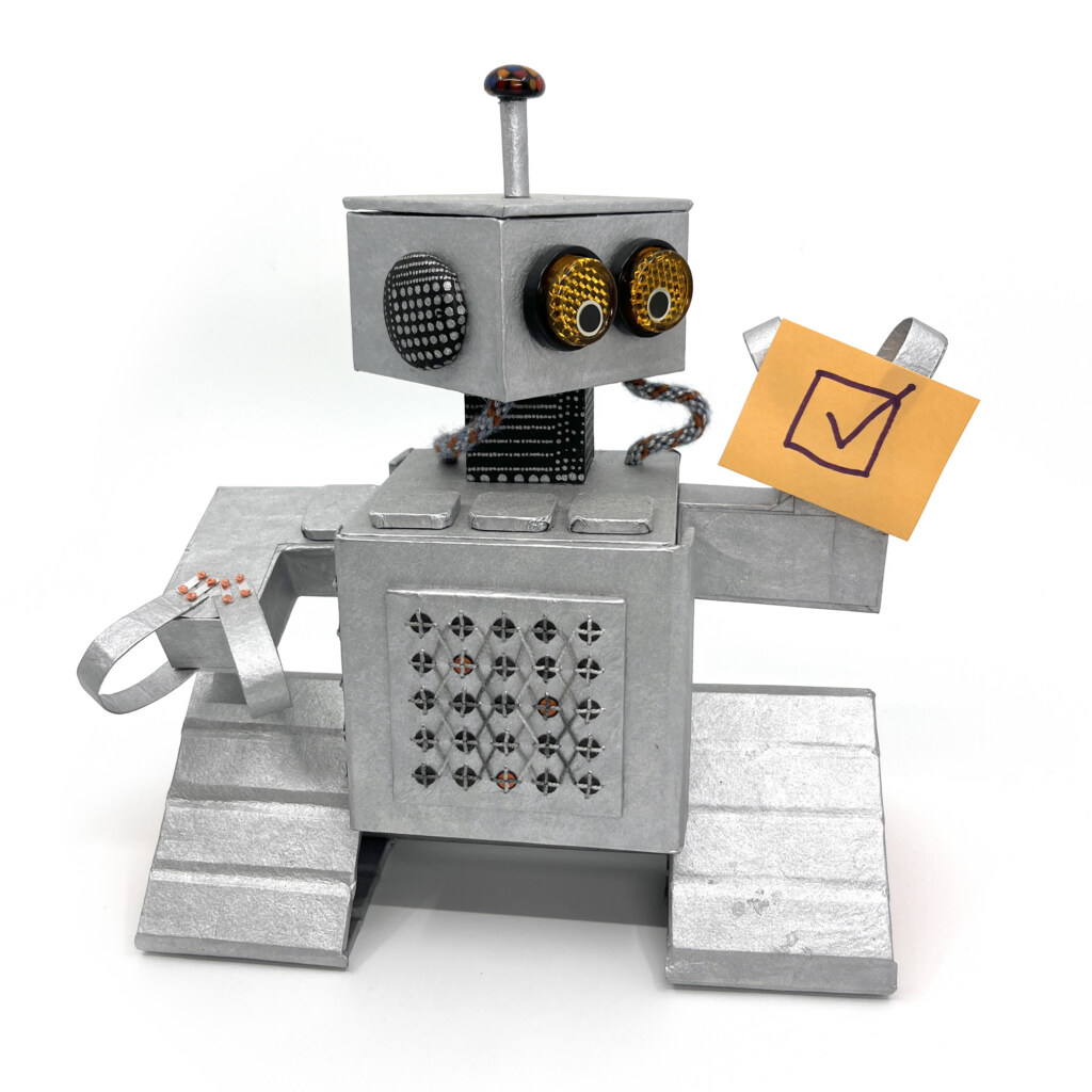 Milo the robot holding a sticky note with a checkbox that is checked drawn on the note