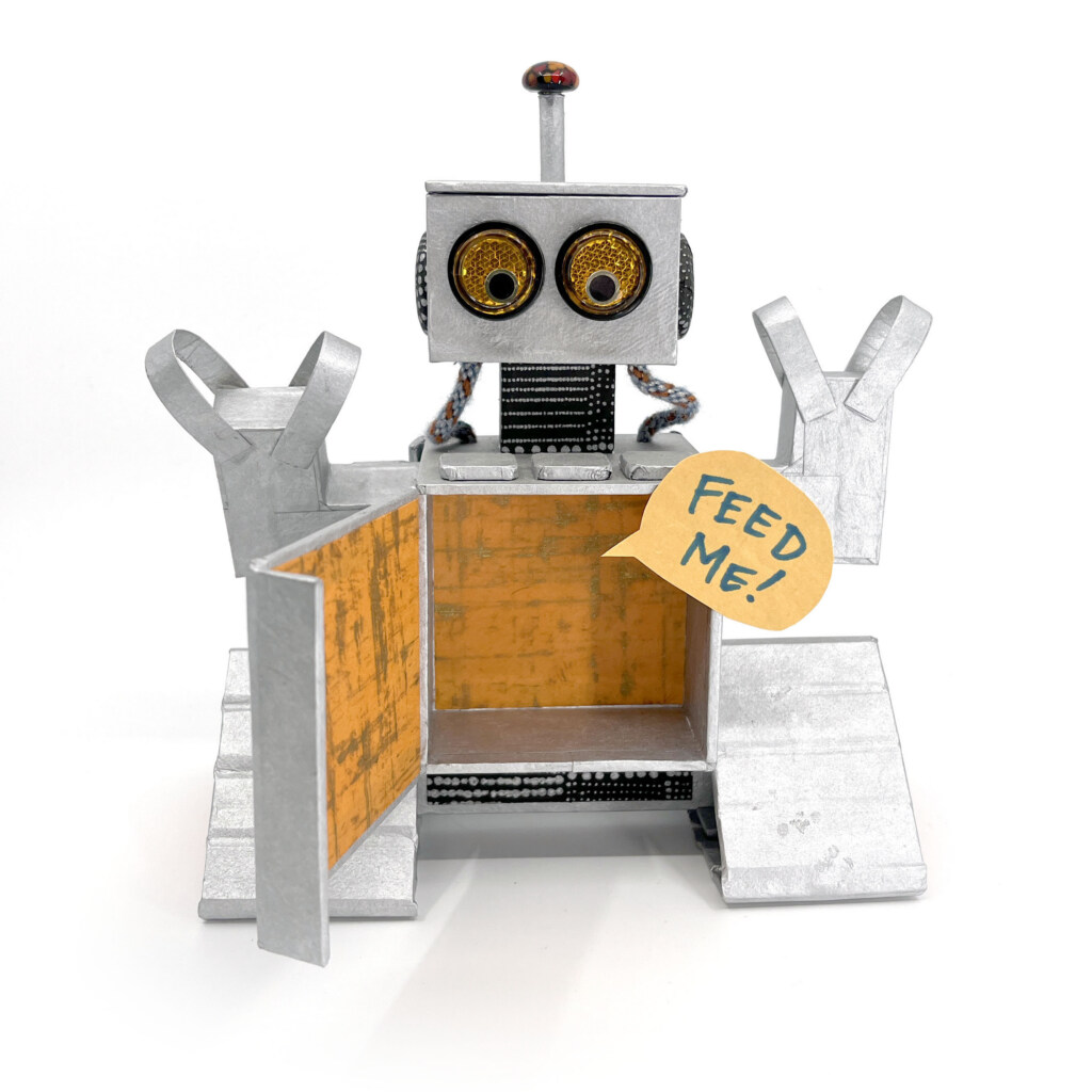 Mlem, Modern Logic’s little silver robot, holding a key